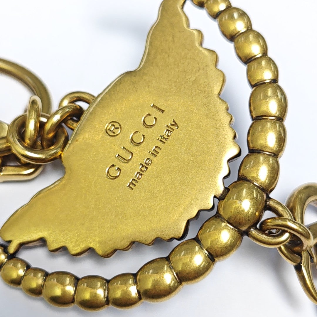 Authenticated pre-owned  Gold-tone Metal Bag Charm - Bag Charm at Looply