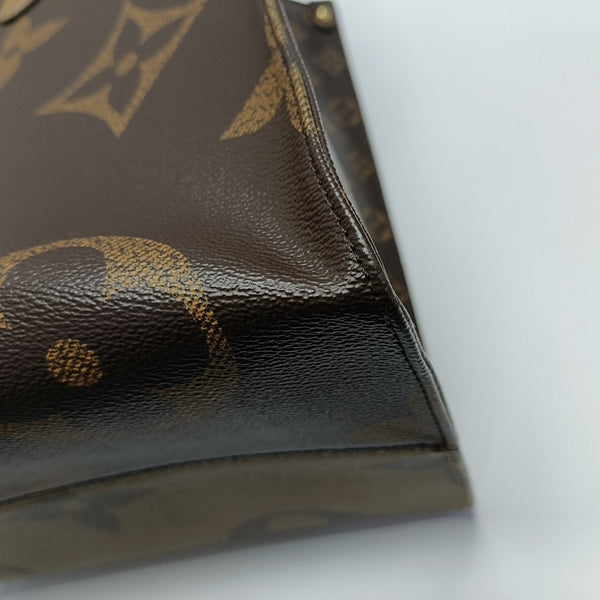 Authenticated pre-owned  Onthego GM Monogram Coated Canvas Brown - Shoulder Bag at Looply