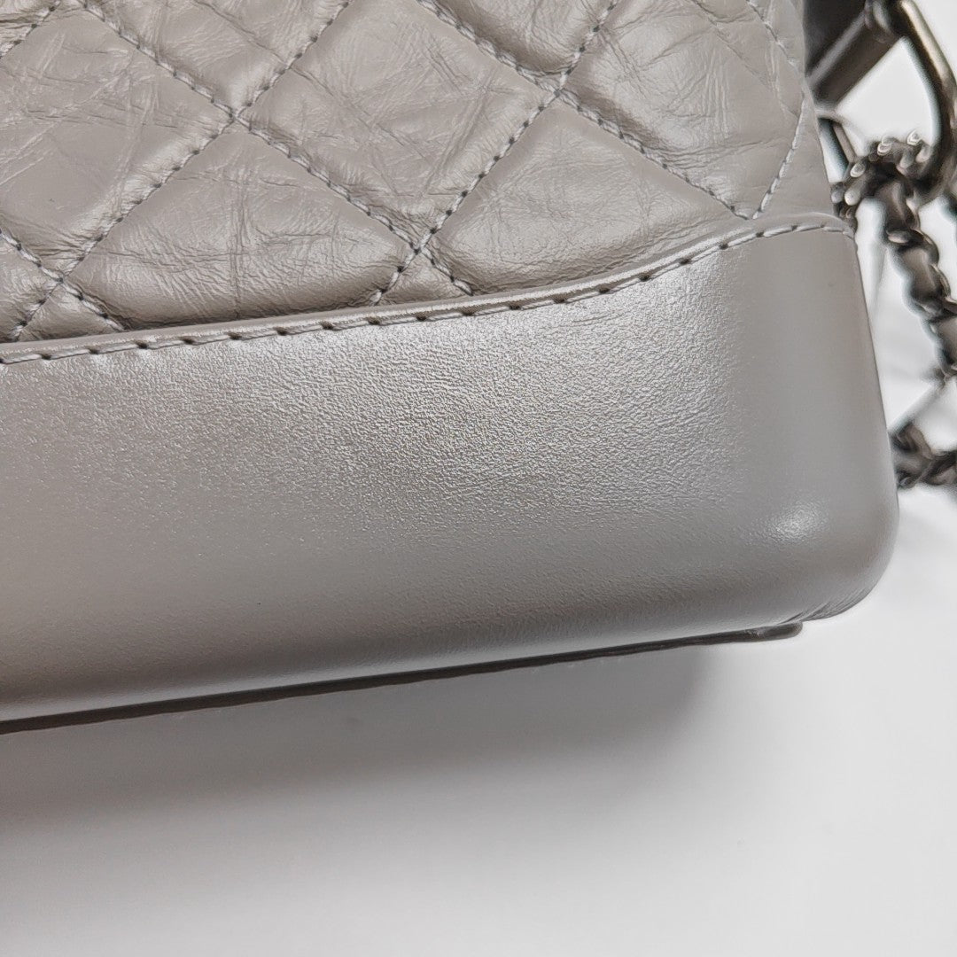 Authenticated pre-owned  Gabrielle Small Quilted Calfskin Gray - Shoulder Bag at Looply
