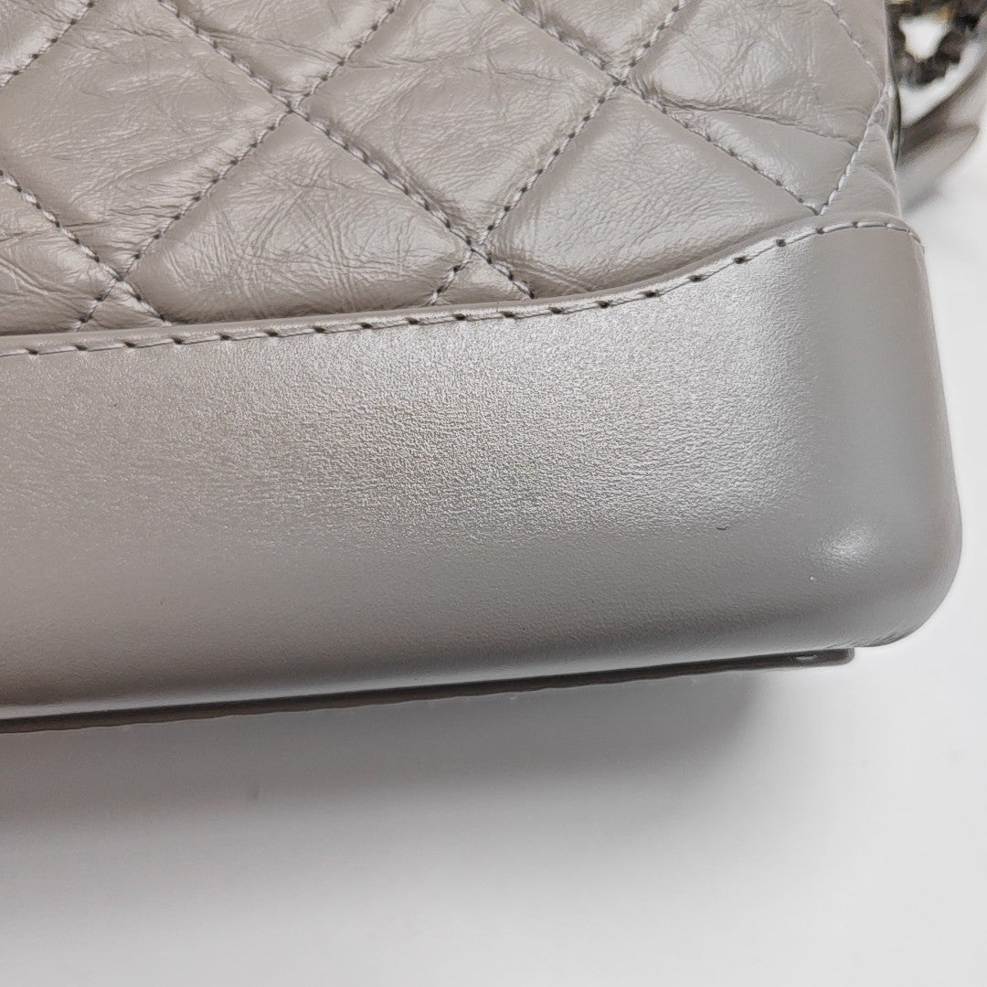 Authenticated pre-owned  Gabrielle Small Quilted Calfskin Gray - Shoulder Bag at Looply