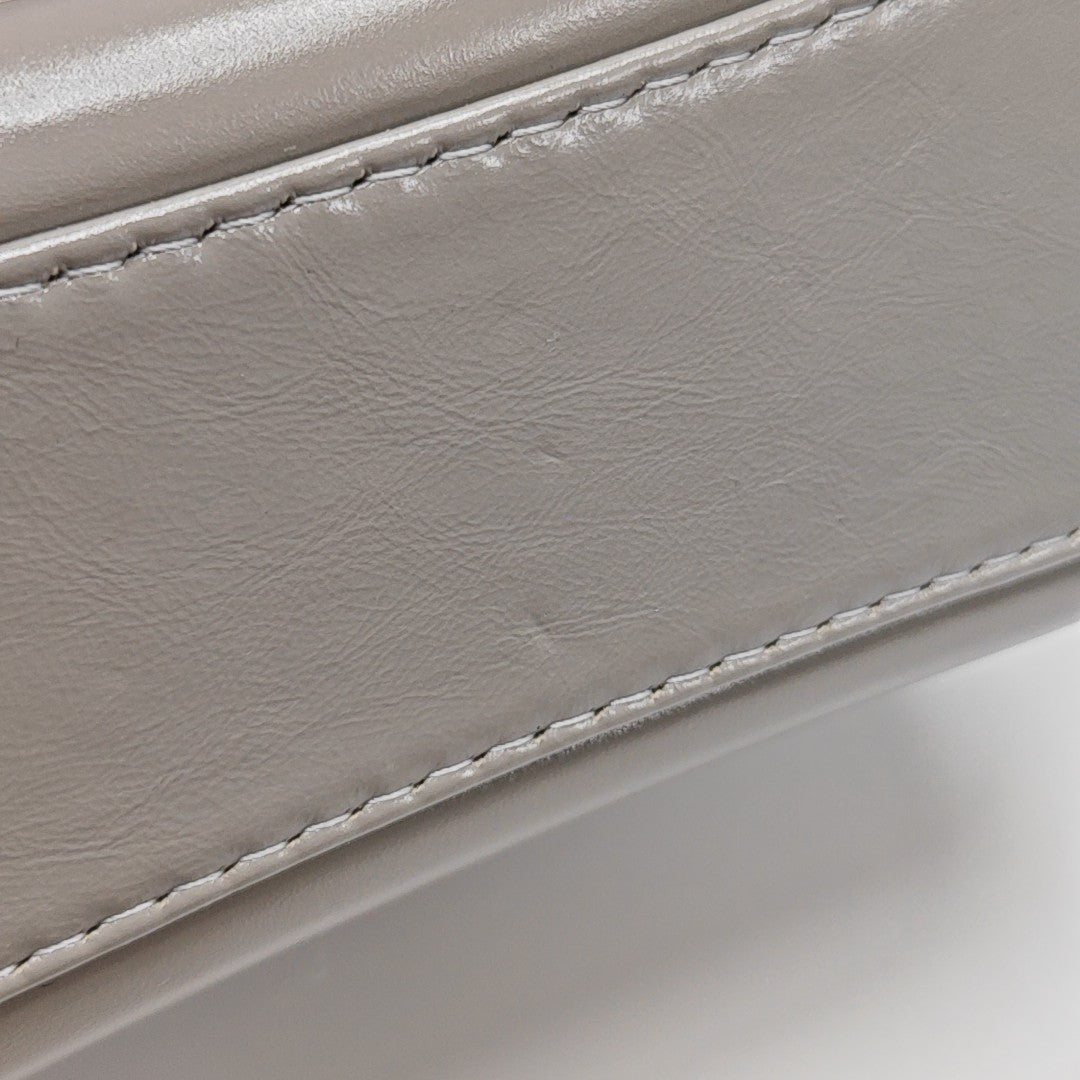 Authenticated pre-owned  Gabrielle Small Quilted Calfskin Gray - Shoulder Bag at Looply