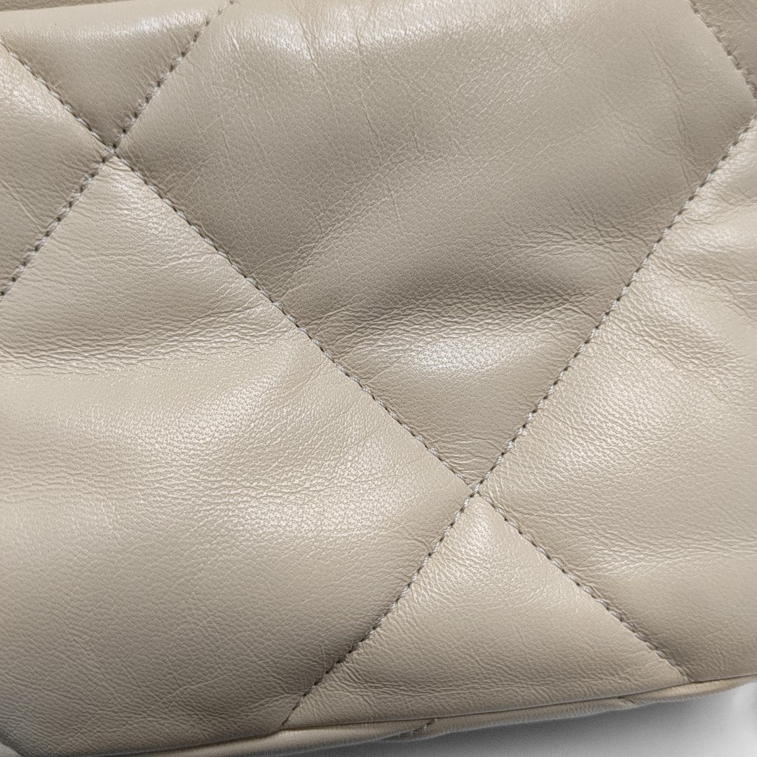 Authenticated pre-owned  Chanel 19 Small Quilted Lambskin Beige - Shoulder Bag at Looply