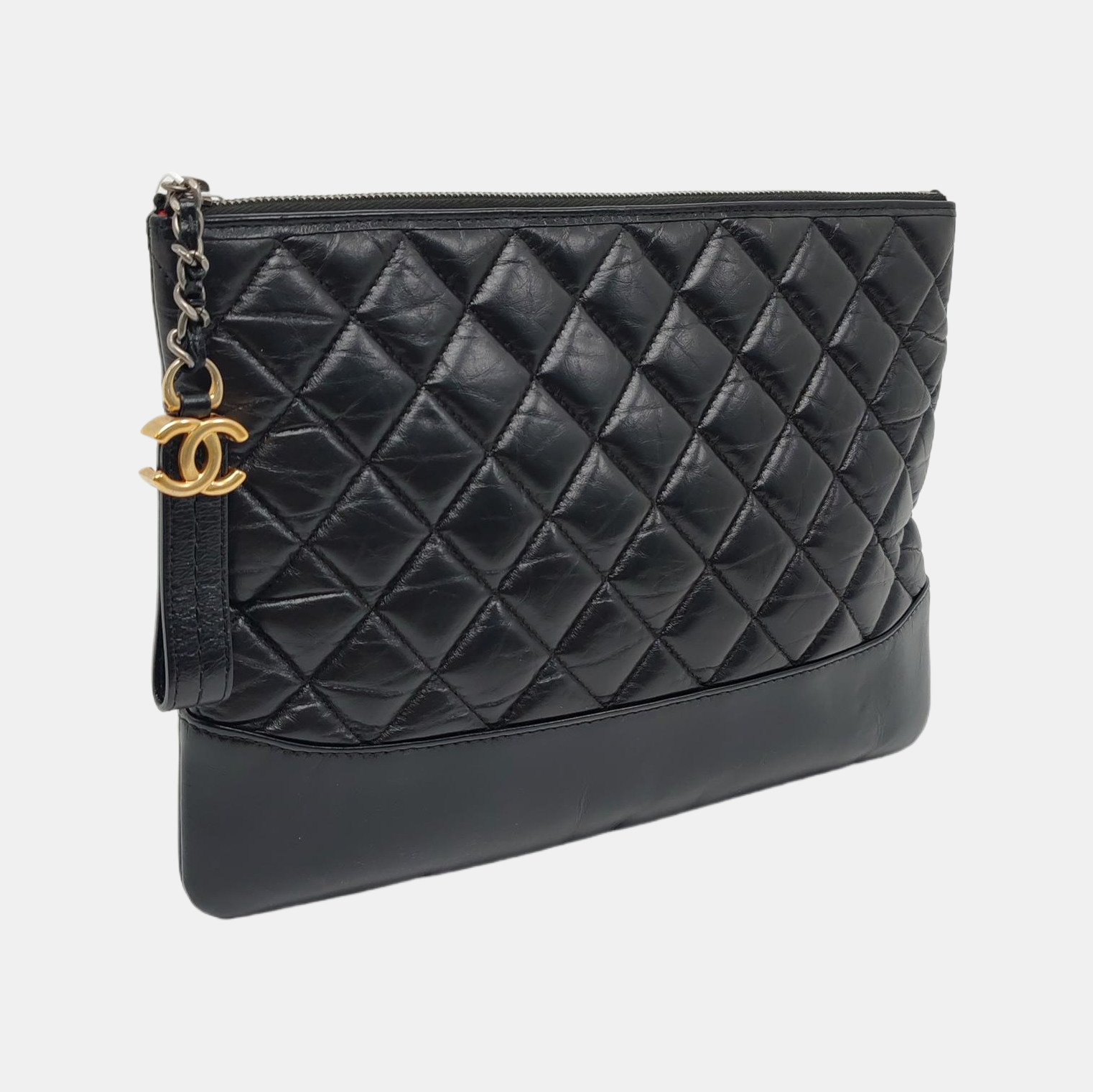 Authenticated pre-owned  Gabrielle Quilted Calfskin Black - Clutch at Looply