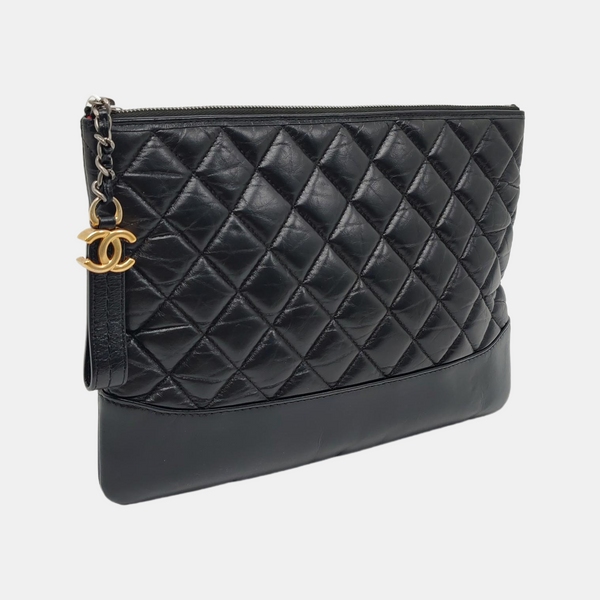 Authenticated pre-owned  Gabrielle Quilted Calfskin Black - Clutch at Looply