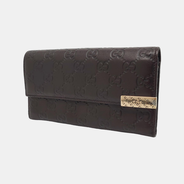 Authenticated pre-owned  Microguccissima Monogram Calfskin Brown Wallet - Wallet at Looply