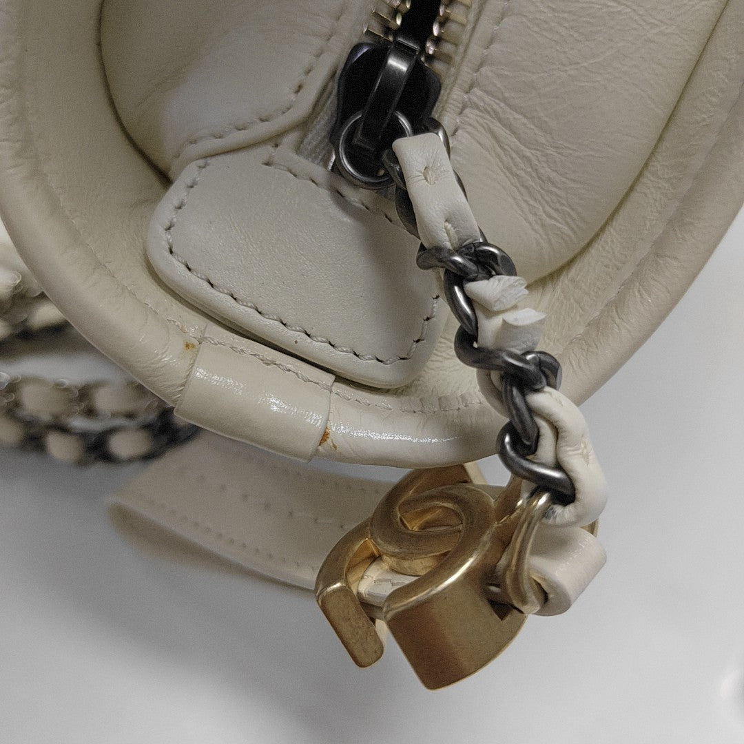 Authenticated pre-owned  Gabrielle Small Quilted Vintage Calf White - Shoulder Bag at Looply