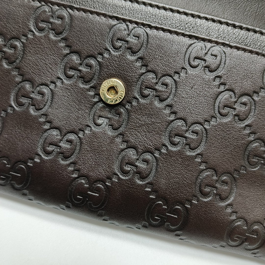 Authenticated pre-owned  Microguccissima Monogram Calfskin Brown Wallet - Wallet at Looply
