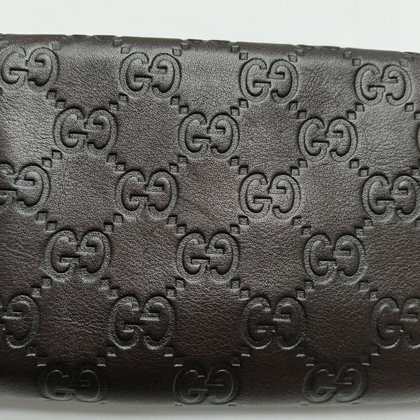 Authenticated pre-owned  Microguccissima Monogram Calfskin Brown Wallet - Wallet at Looply