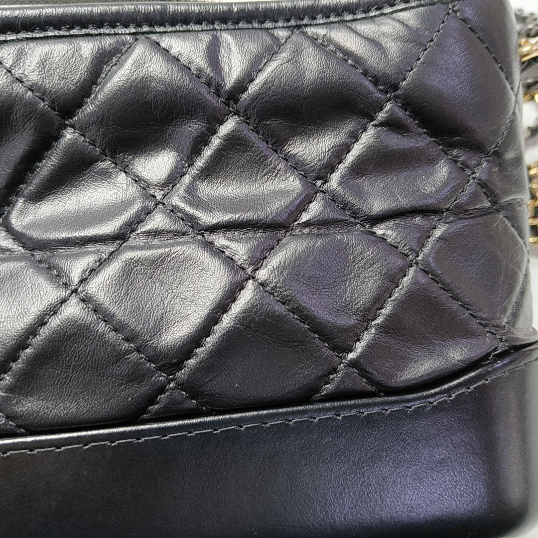 Authenticated pre-owned  Gabrielle Small Quilted Vintage Calf Black - Shoulder Bag at Looply