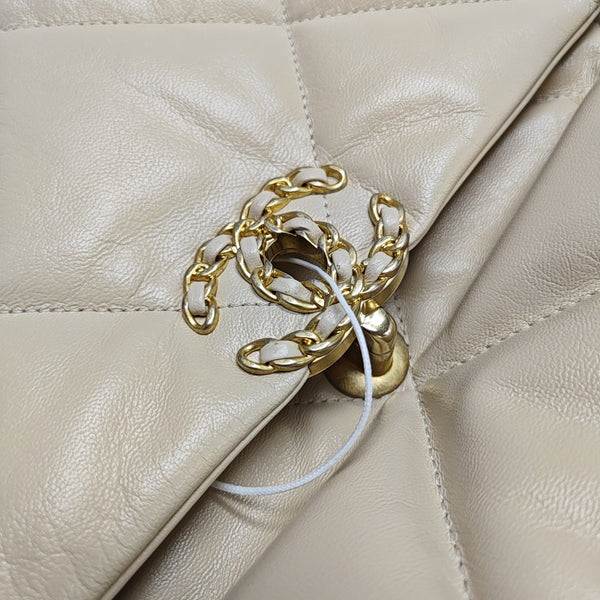 Authenticated pre-owned  Chanel 19 Maxi Quilted Lambskin Beige - Shoulder Bag at Looply