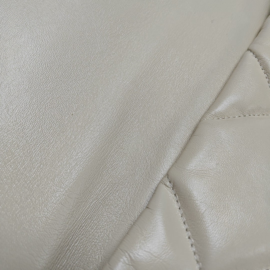 Authenticated pre-owned  Chanel 19 Maxi Quilted Lambskin Beige - Shoulder Bag at Looply