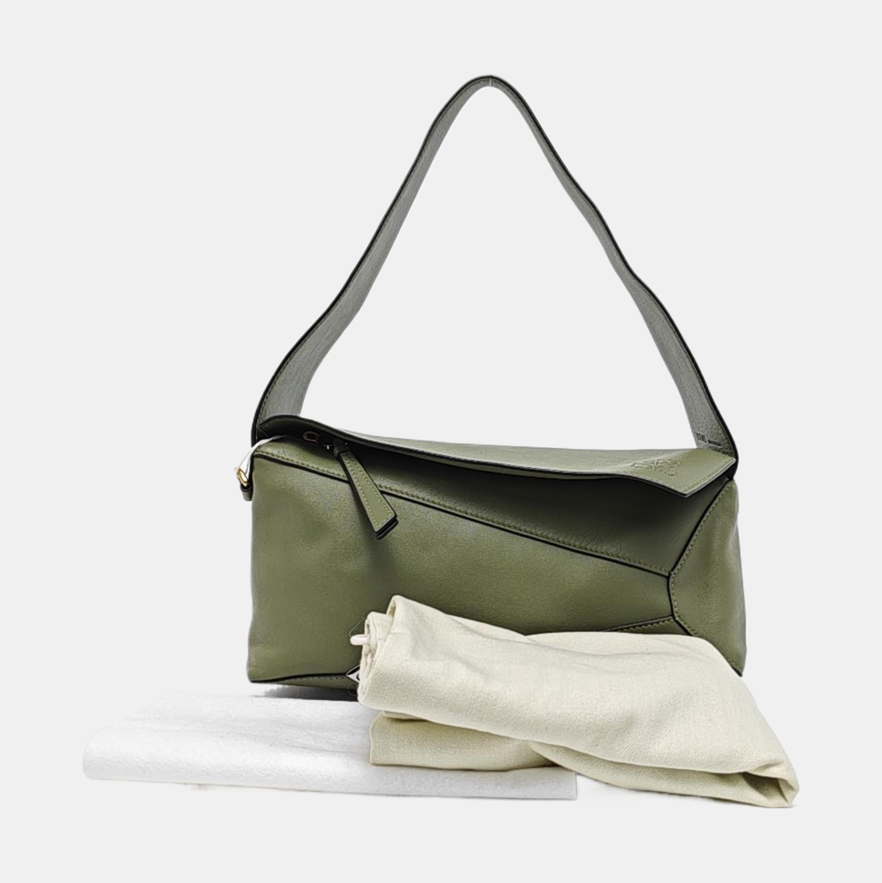 Authenticated pre-owned  Puzzle Hobo Calfskin Green - Top Handle Bag at Looply