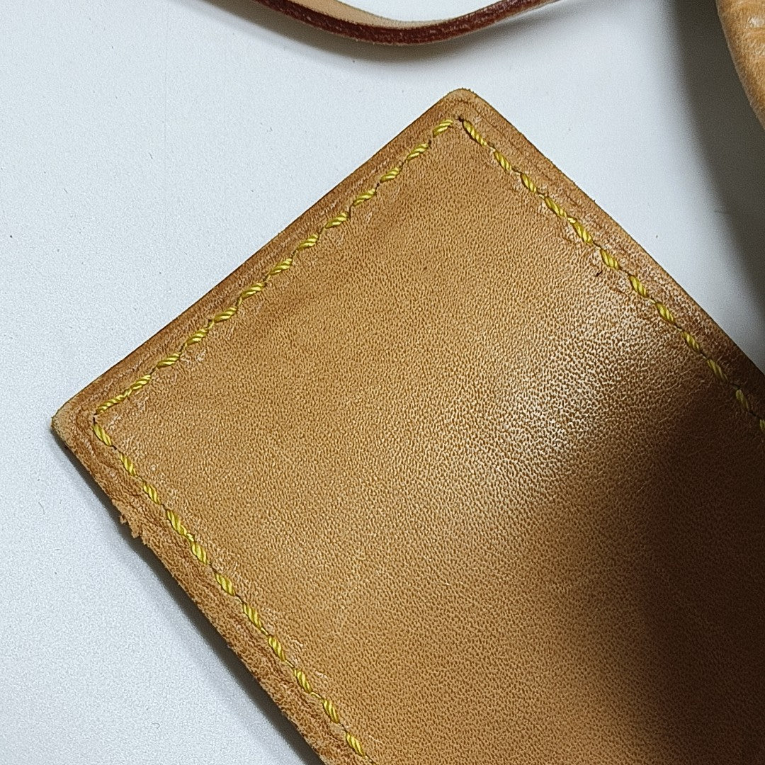 NÉONOÉ MM Monogram Coated Canvas White