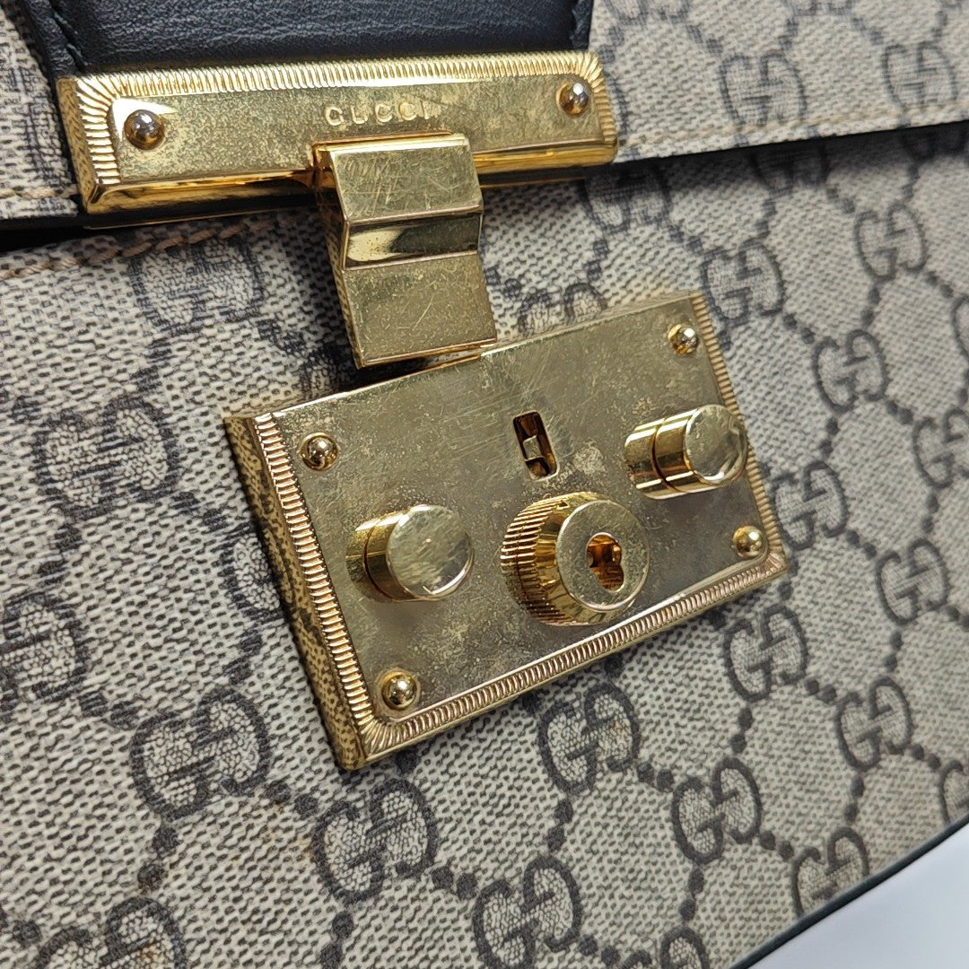Padlock Small Monogram Coated Canvas Beige