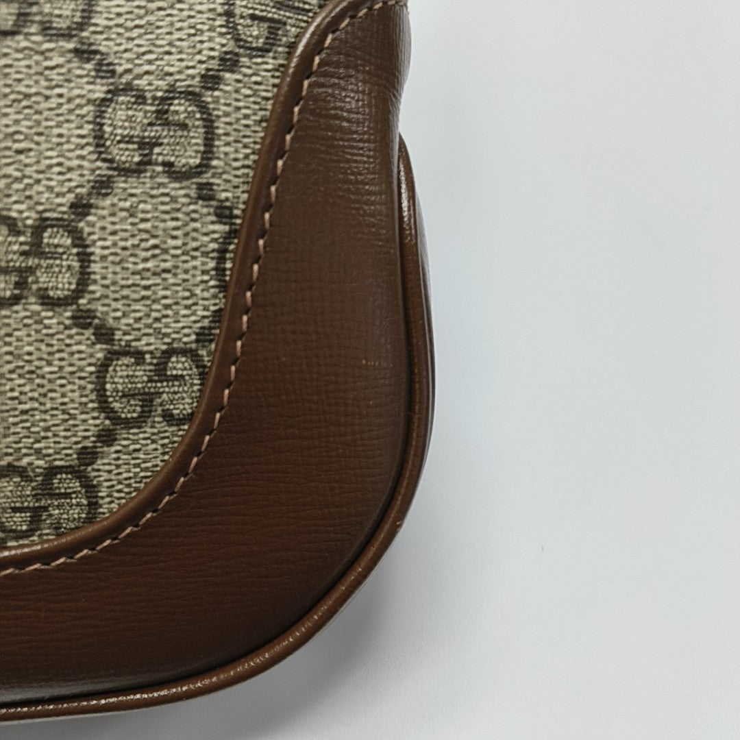 Authenticated pre-owned  Jackie 1961 Small Monogram Coated Canvas Beige - Top Handle Bag at Looply