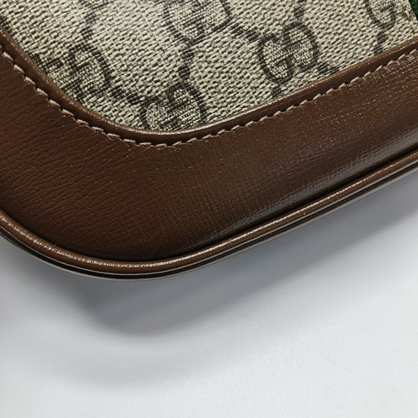 Authenticated pre-owned  Jackie 1961 Small Monogram Coated Canvas Beige - Top Handle Bag at Looply