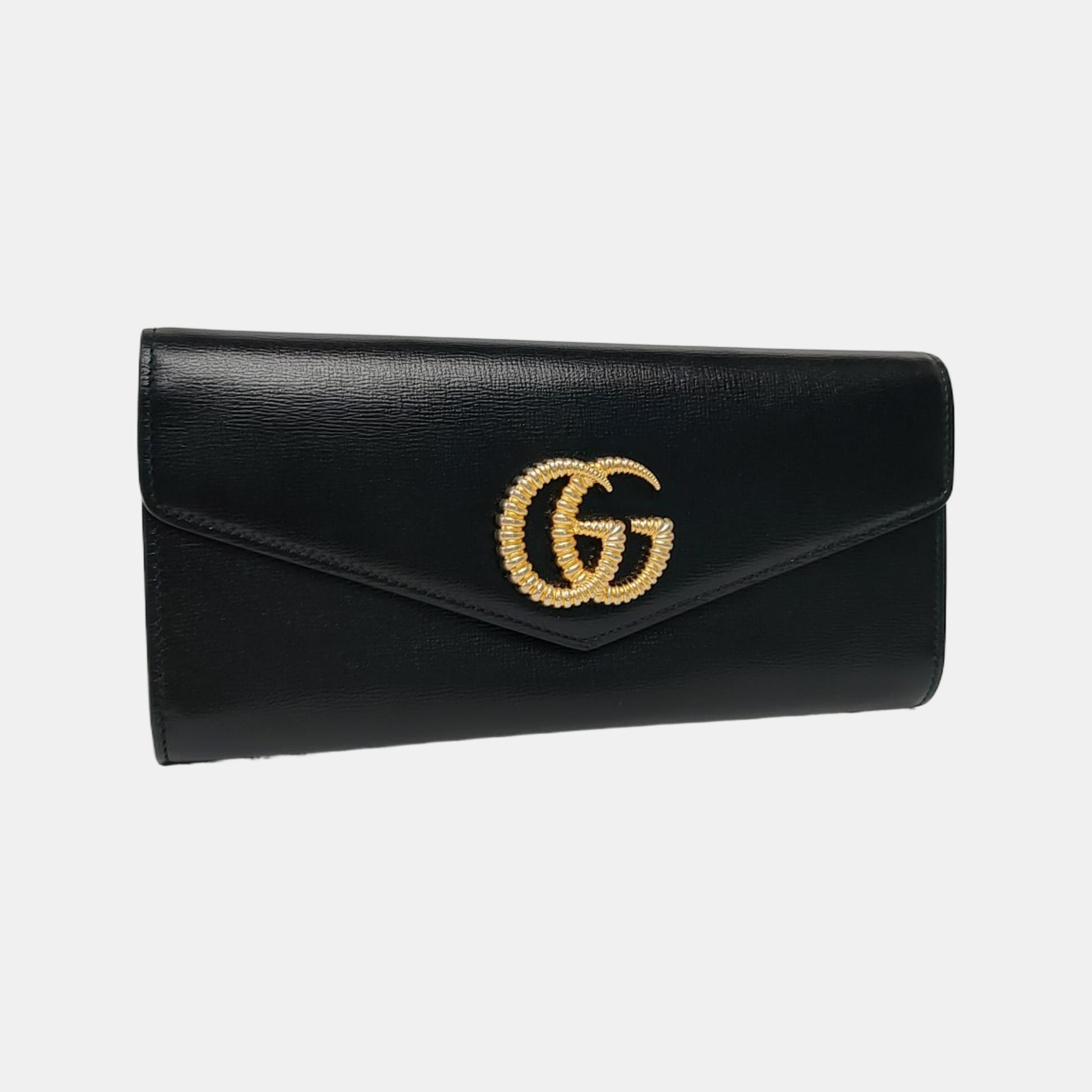 Authenticated pre-owned  GG Marmont Calfskin Black - Clutch at Looply