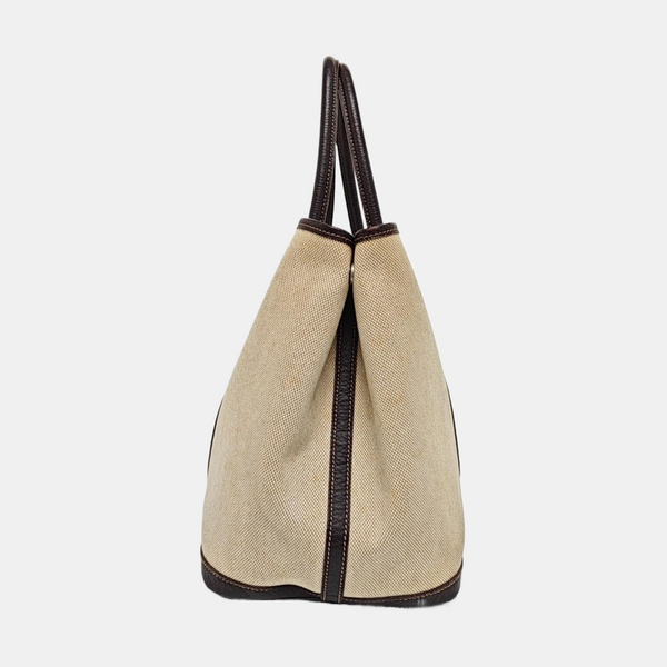 Authenticated pre-owned  Garden Party 36 Canvas Beige - Top Handle Bag at Looply