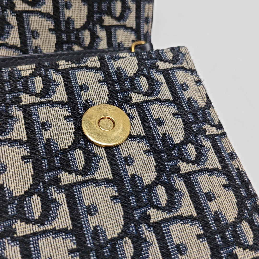 Authenticated pre-owned  Saddle Monogram Canvas Blue - Shoulder Bag at Looply