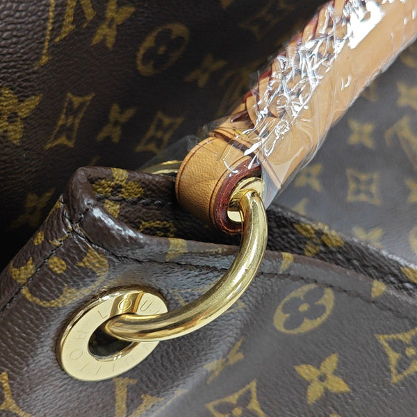 Authenticated pre-owned  Artsy MM Monogram Coated Canvas Brown - Top Handle Bag at Looply