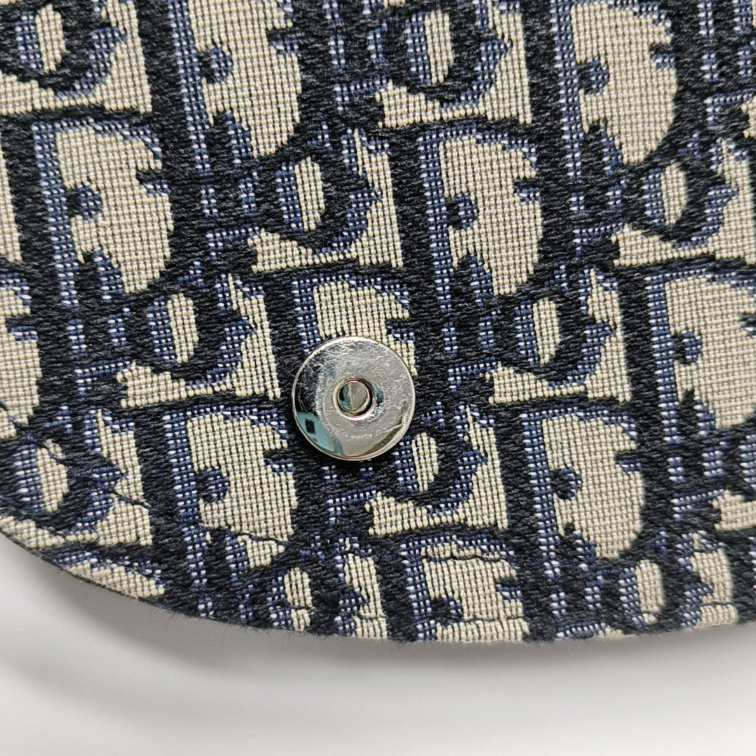 Authenticated pre-owned  Saddle Monogram Canvas Blue - Shoulder Bag at Looply