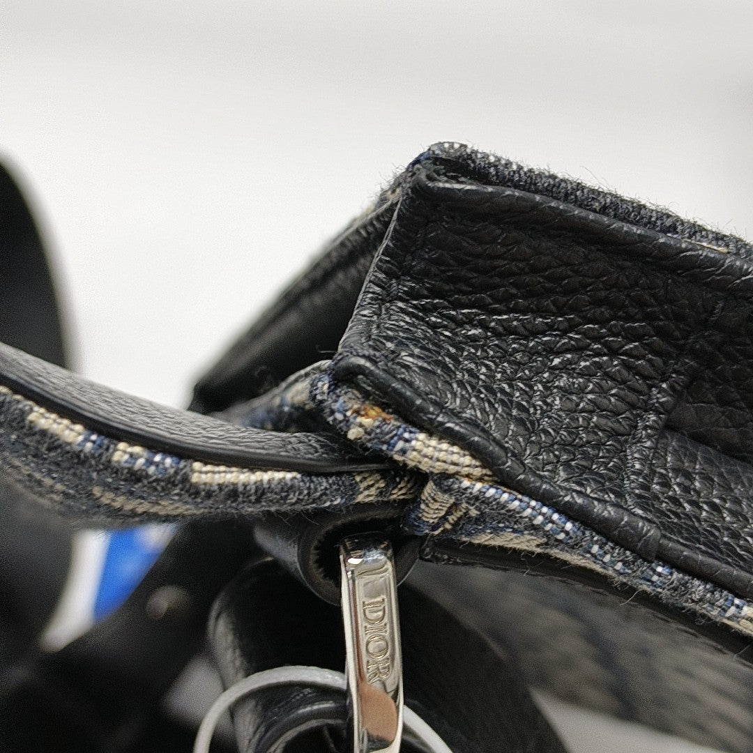 Authenticated pre-owned  Saddle Monogram Canvas Blue - Shoulder Bag at Looply