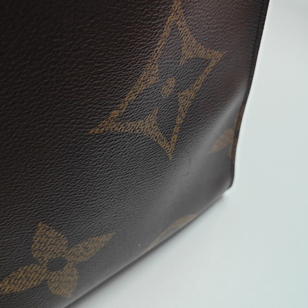 Authenticated pre-owned  Onthego GM Monogram Coated Canvas Brown - Shoulder Bag at Looply