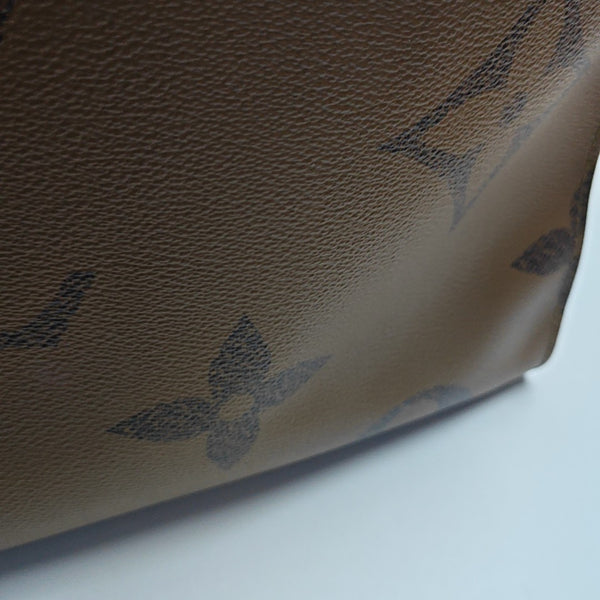 Authenticated pre-owned  Onthego GM Monogram Coated Canvas Brown - Shoulder Bag at Looply