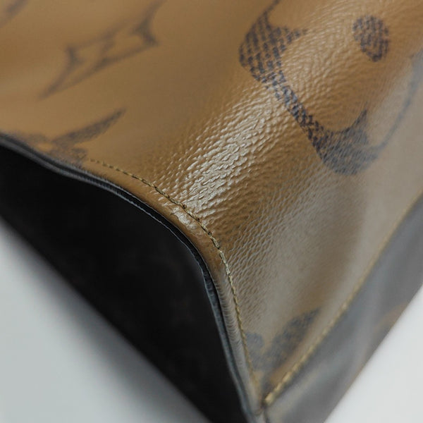 Authenticated pre-owned  Onthego GM Monogram Coated Canvas Brown - Shoulder Bag at Looply