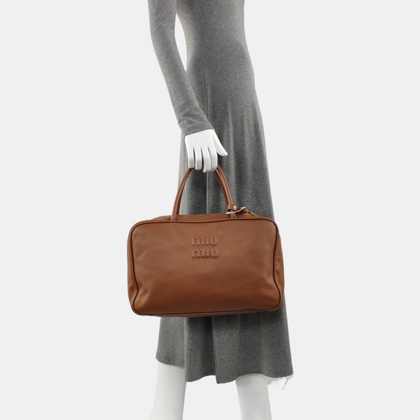 Authenticated pre-owned  Beau Large Calfskin Brown - Top Handle Bag at Looply