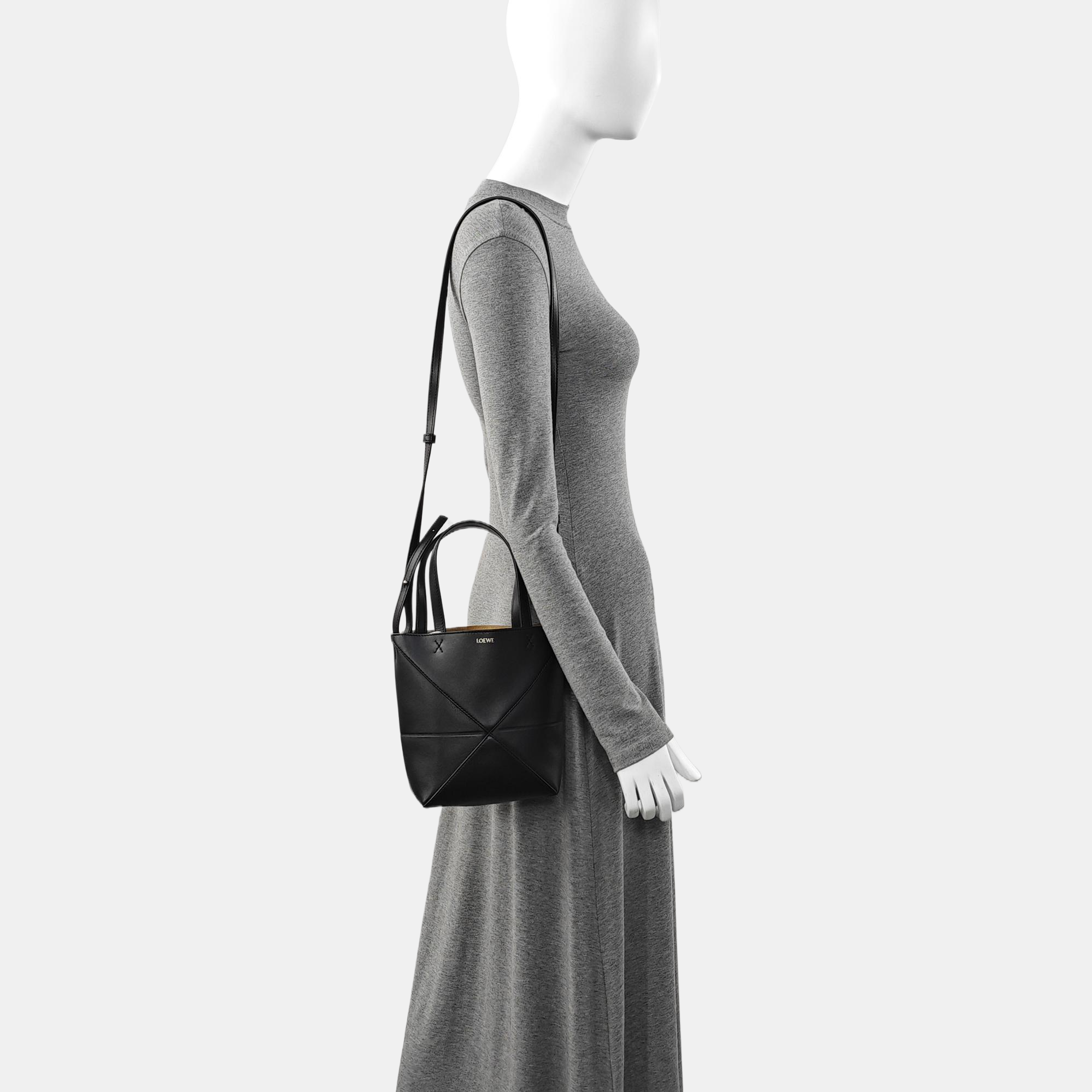 Authenticated pre-owned  Puzzle Fold Mini Calfskin Black - Shoulder Bag at Looply