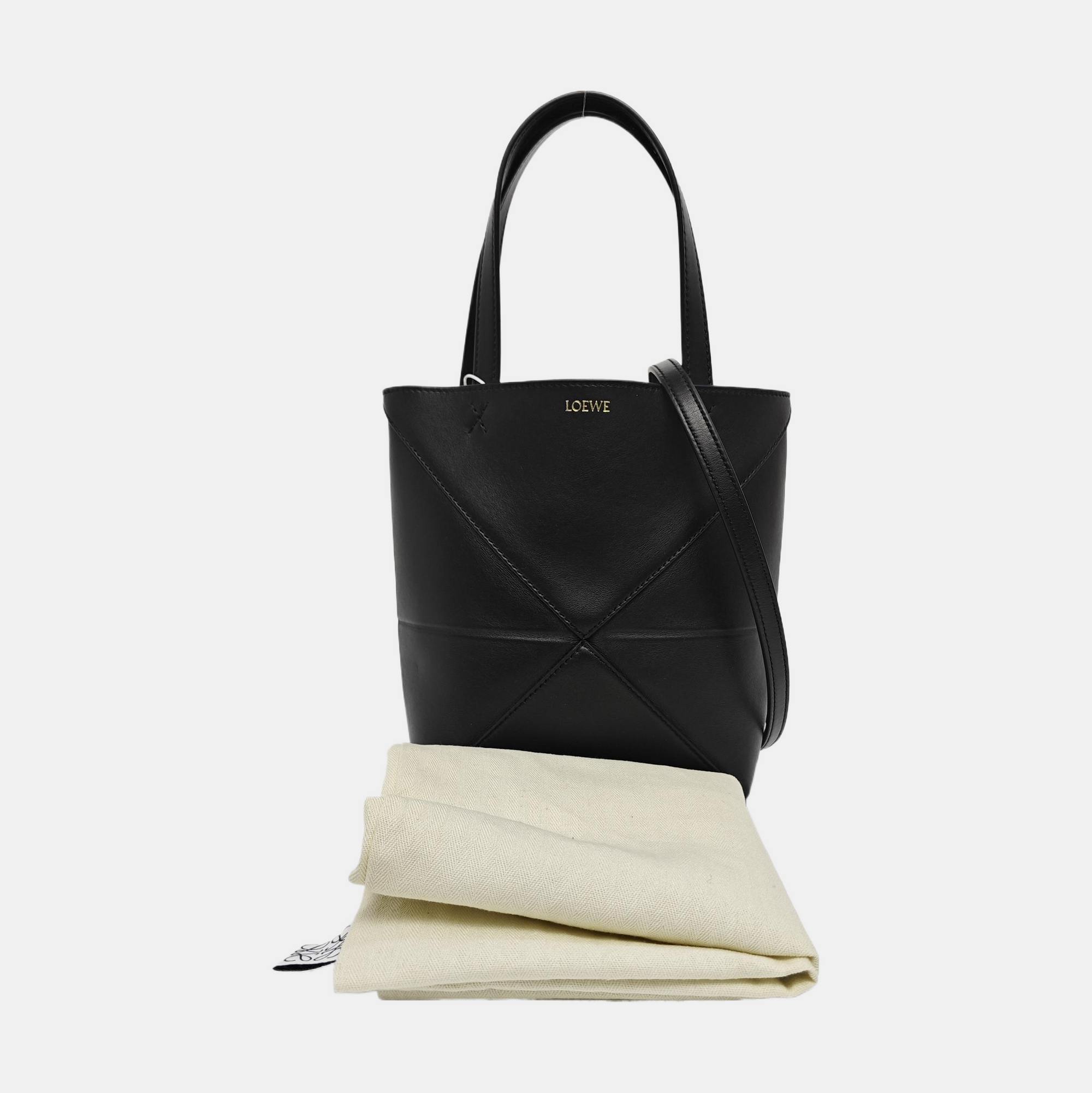Authenticated pre-owned  Puzzle Fold Mini Calfskin Black - Shoulder Bag at Looply