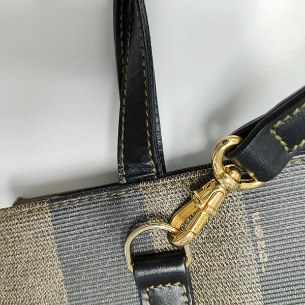 Bolso de hombro de lona revestida marrón