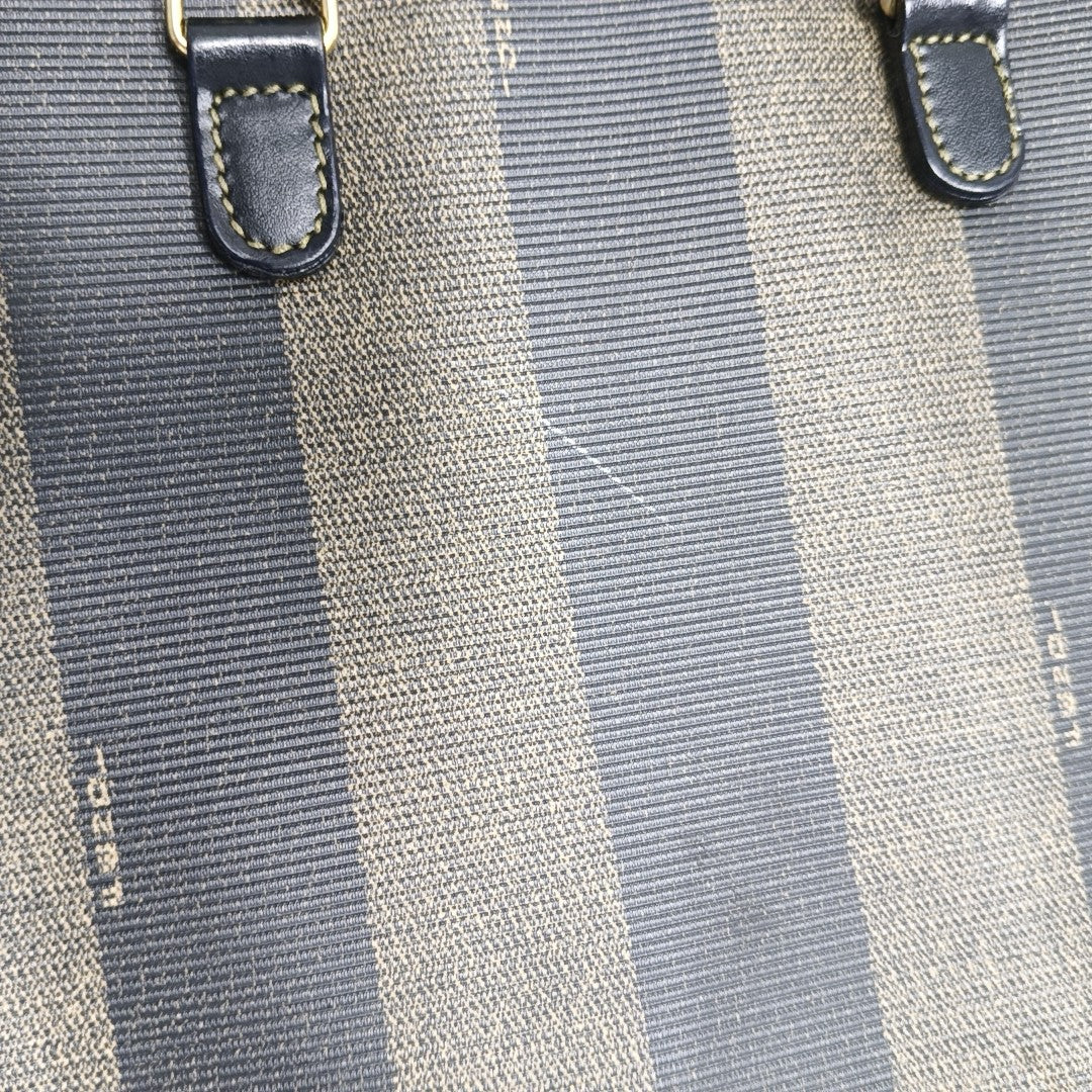Bolso de hombro de lona revestida marrón