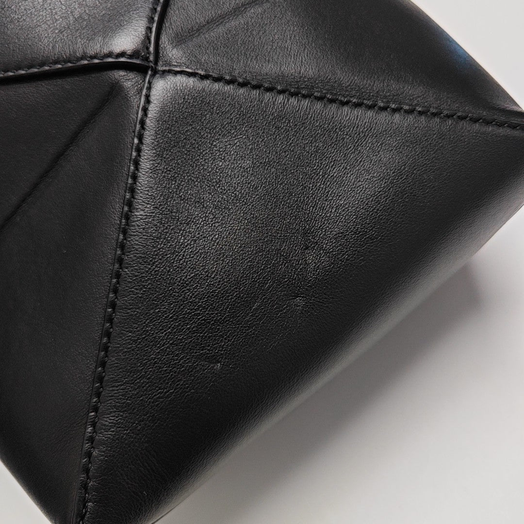 Authenticated pre-owned  Puzzle Fold Mini Calfskin Black - Shoulder Bag at Looply