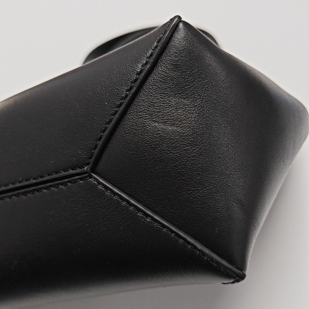 Authenticated pre-owned  Puzzle Fold Mini Calfskin Black - Shoulder Bag at Looply