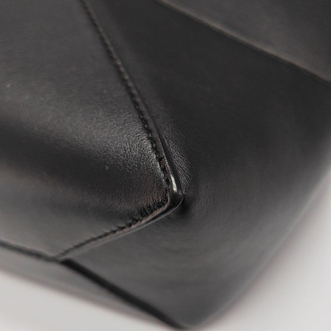 Authenticated pre-owned  Puzzle Fold Mini Calfskin Black - Shoulder Bag at Looply