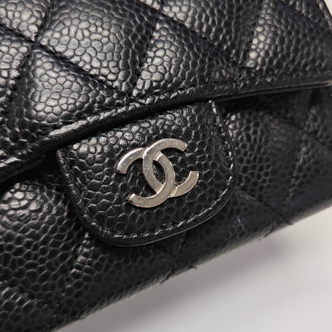 Authenticated pre-owned  Classic Flap Quilted Grained Calfskin Black Card Holder - Card Holder at Looply