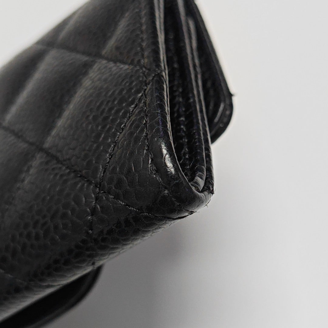 Authenticated pre-owned  Classic Flap Quilted Grained Calfskin Black Card Holder - Card Holder at Looply