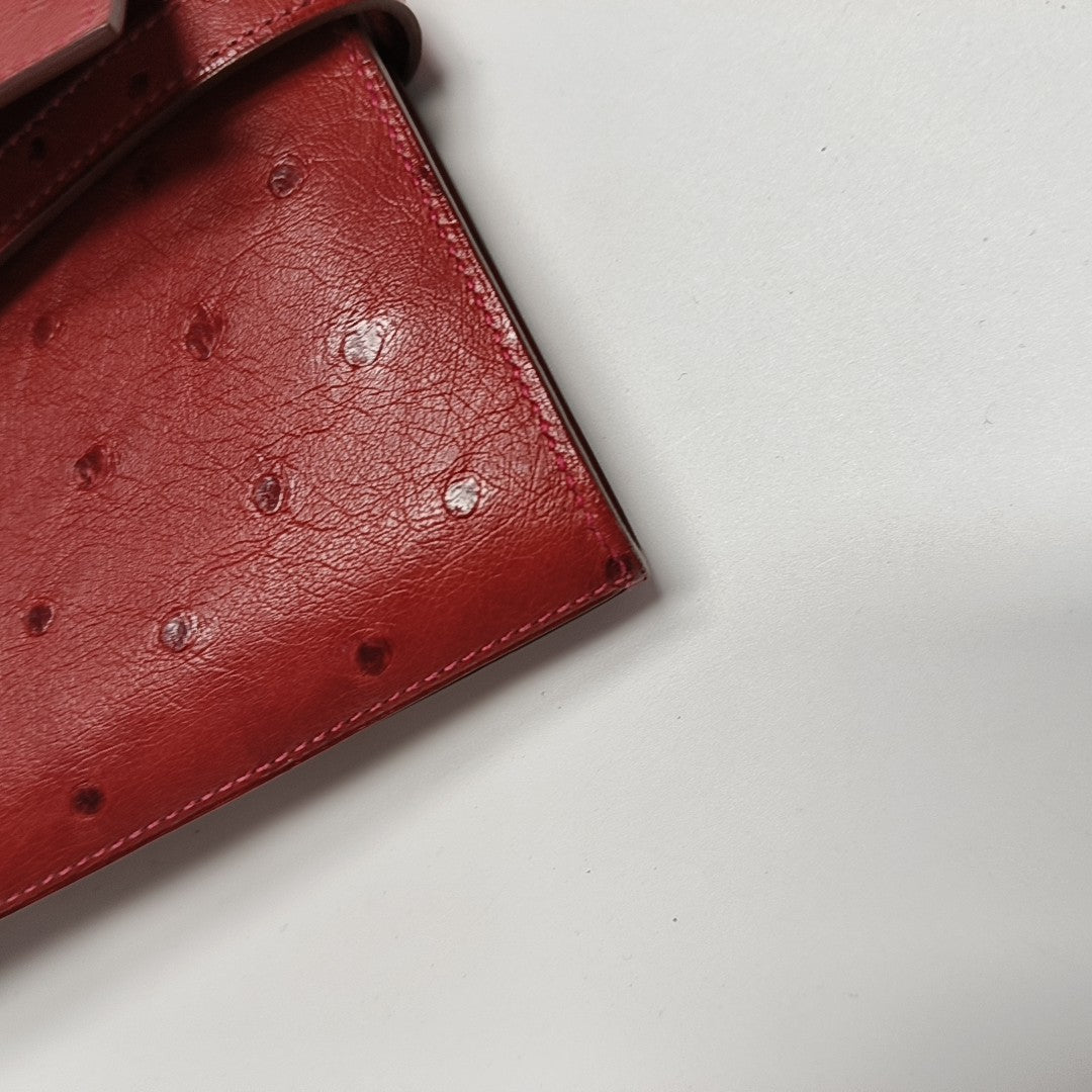 Authenticated pre-owned  Kelly Ostrich Red Wallet - Wallet at Looply
