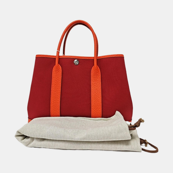 Authenticated pre-owned  Garden Party Canvas Burgundy - Top Handle Bag at Looply
