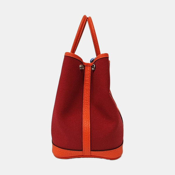 Authenticated pre-owned  Garden Party Canvas Burgundy - Top Handle Bag at Looply