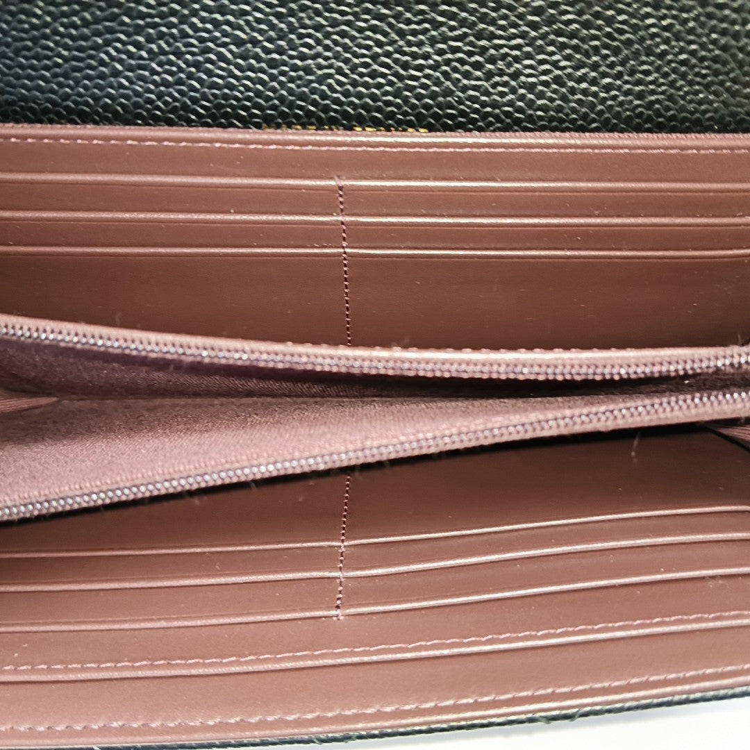 Authenticated pre-owned  Classic Flap Quilted Grained Calfskin Black Wallet - Wallet at Looply