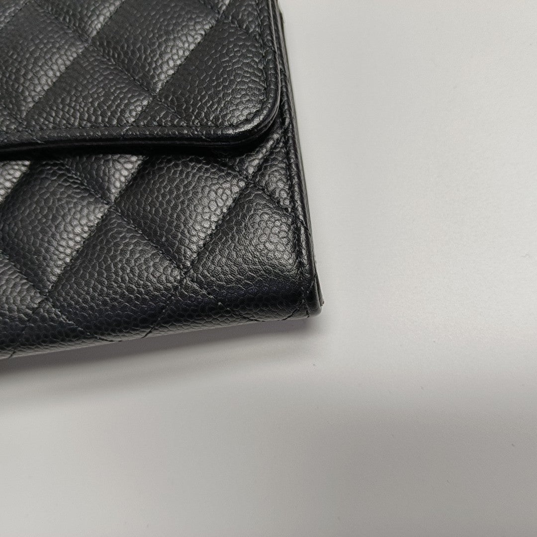 Authenticated pre-owned  Classic Flap Quilted Grained Calfskin Black Wallet - Wallet at Looply