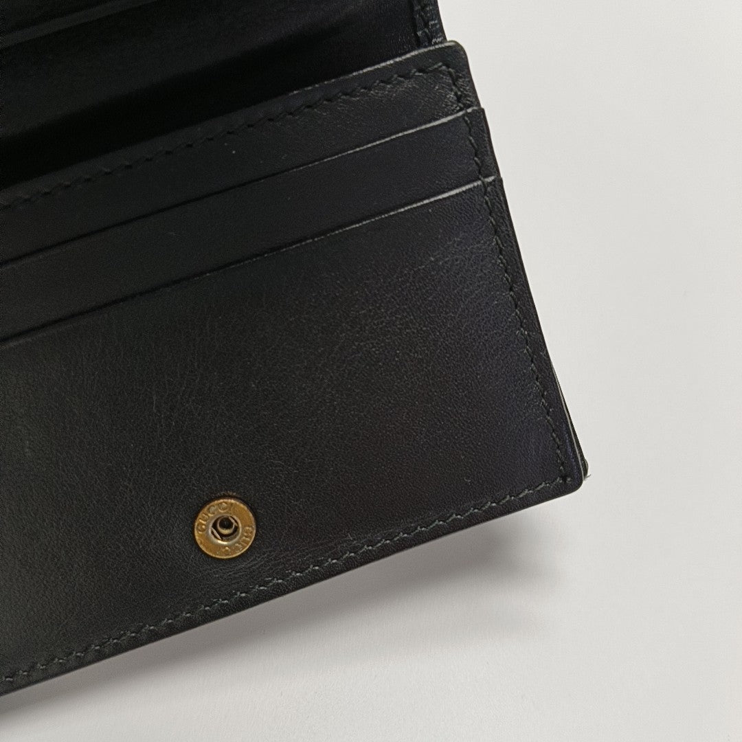Authenticated pre-owned  GG Marmont Calfskin Black Card Holder - Card Holder at Looply