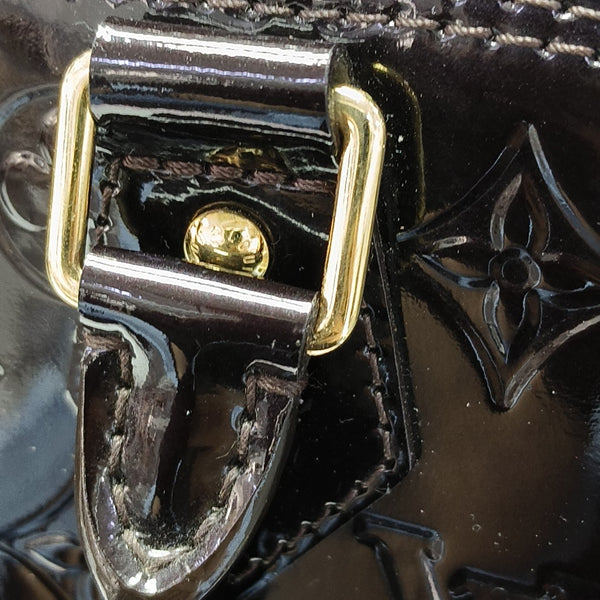 Authenticated pre-owned  Alma PM Monogram Patent Leather Brown - Top Handle Bag at Looply