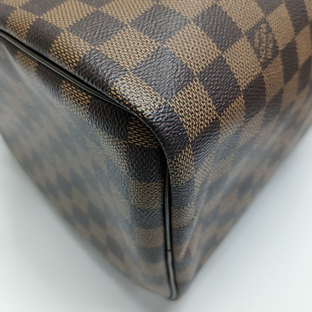 Authenticated pre-owned  Speedy 30 Damier Ebene Coated Canvas Brown - Top Handle Bag at Looply