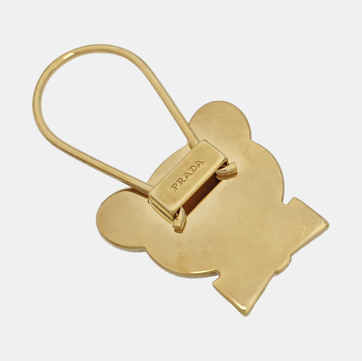 Authenticated pre-owned  Gold-tone Metal Bag Charm - Bag Charm at Looply