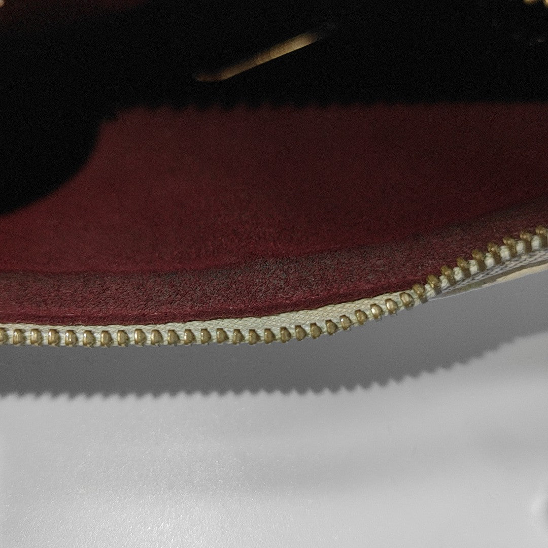 Monogram Coated Canvas White