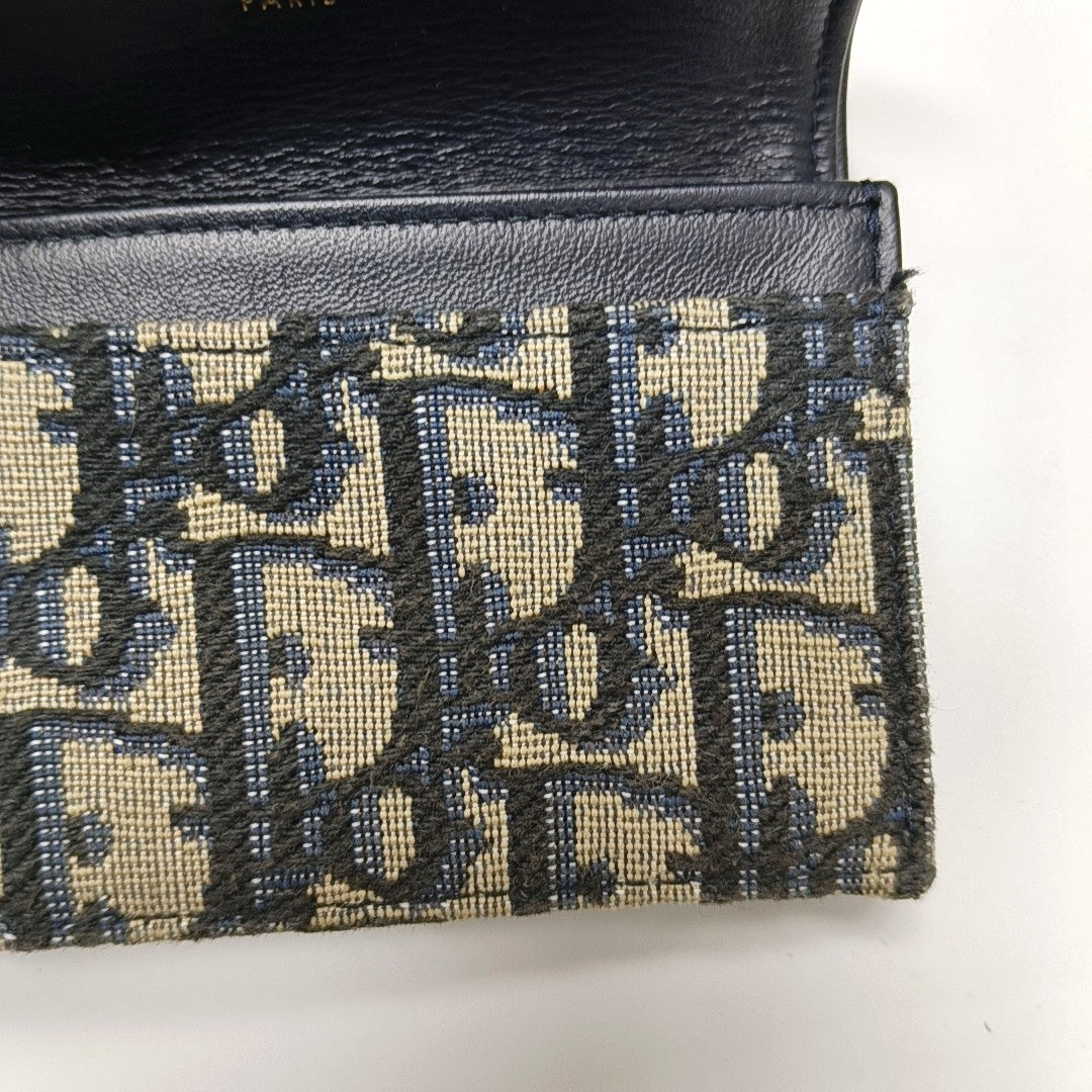 Authenticated pre-owned  Saddle Oblique Canvas Blue Card Holder - Card Holder at Looply